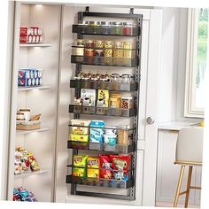 the pantry door is open to reveal an assortment of food and snacks on shelves in it