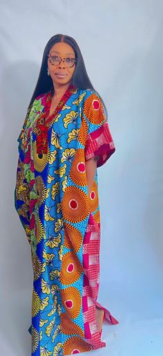 Ankara Cotton Kaftan maxi dress. It can be styled in different ways, you can dress it up with high heels or dress down with flats/sneakers. Other prints are also available, kindly start a conversation to ask for more information and pics.Contact us for custom looks and more style options. Sizing 🌺 Your height or desired kaftan length is needed. It is a free size but we still require your US/UK size and the length , and it can be adjusted/custom made depending on your height. (please indicate your size and height when you order).🌺 It is easy to wear, comfortable, and very stylish. Please do the following before completing your order;✅ Write your phone number to make shipping easier .✅ Include your height and measurements and other needed information. Please send us a message for further d Multicolor Maxi Dress For Beach Cover-up, Red Kaftan With Vibrant Print For Spring, Spring Red Kaftan With Vibrant Print, Red Spring Kaftan With Vibrant Print, Red Midi Dress For Beach Cover-up, Vibrant Red V-neck Maxi Dress, Vibrant Printed V-neck Maxi Dress, Casual Maxi Dress With Floral Print And Kimono Sleeves, Vibrant Maxi Dress For Festivals