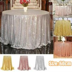 the table cloth is shiny and has sequins on it, as well as flowers