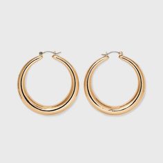 Update your jewelry pieces for any occasion with these Thick Hoop Earrings from A New Day™. These round hoop earrings feature a simple thick profile and a gold-tone metallic finish that pairs effortlessly with your existing jewelry items. These lightweight hoop earrings come with hinge closures for secure and comfortable wear, and are made from nickel-free metal to suit most skin types. A New Day™: Style that goes wherever you do. Gold Hoop Earrings Aesthetic Simple, Gold Hoop Earrings Aesthetic, Brrr Basket, Big Gold Hoop Earrings, Hoop Earrings Aesthetic, Little Words Project, Bold Statement Necklaces, Thick Hoop Earrings, Earrings Aesthetic