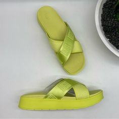 Ugg Women's Emily Mesh Slide Square Toe Sandal In Pollen Mesh Neon Green 9.5/10 !!!Left Is 9.5 And Right Is 10 Color Pollen Mesh Floor Model Mesh, Ugg Webbing Upper Leather Sockliner + Imprint By Ugg Footbed Durable Rubber Outsole Square Toe, Medial Elastic Gore Eva Midsole About 1.5”Height Updated With Ultra-Breathable Mesh To Keep You Cool, The Emily Is A Stylish And Supportive Choice For Summer, Incorporating An Innovative Imprint By Ugg Sole With Three Layers Of Cushioning. Featuring Trend-R Green Synthetic Slides For Spring, Neon Yellow Sandals For Beach In Summer, Casual Neon Yellow Sandals For Beach, Yellow Sandals With Cushioned Footbed For Spring, Green Slides With Round Toe, Neon Yellow Round Toe Sandals For Summer, Yellow Synthetic Slip-on Slides, Yellow Cushioned Sandals For Spring, Neon Yellow Round Toe Synthetic Sandals