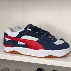 Puma-180 Corduroy Taps Into Late-90s Skate Sneaker Culture. The Oversized Padding, Chunky Shapes, And Lo-Fi Technical Uppers Are All Throwbacks To That Era. Color : Navy/Red Casual High-top Skate Shoes With Puma Logo, Navy Sporty Skate Shoes For Streetwear, Sporty Navy Low-top Skate Shoes, Navy Low-top Casual Skate Shoes, Casual Navy Low-top Skate Shoes, Casual Puma Lace-up Skate Shoes, Sporty Navy Sneakers For Skateboarding, Casual Lace-up Skate Shoes With Puma Logo, Puma Low-top Skate Shoes For Skateboarding