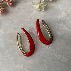 "Crown Trifari earrings Red enamel shaped like horseshoes Stamped inside rim * Has some discolorations on metal 1.5\" x 3/4\"" Red Enamel Hoop Earrings For Gifts, Red Enamel Hoop Earrings Gift, Elegant Horseshoe Earrings For Gift, Retro Enamel Earrings As Gift, Red Enamel Pierced Earrings, Red Pierced Enamel Earrings, Red Enamel Earrings, Red Teardrop Hoop Earrings, Red Teardrop Hoop Earrings For Pierced Ears