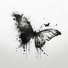 a black and white photo of a butterfly with paint splatters on it's wings