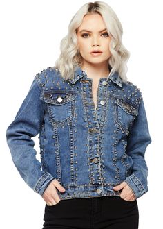 Give your denim look a chic update with this studded denim jacket. This medium wash denim jacket is crafted from a premium fabric with a soft handfeel and is shaped to a classic, fitted silhouette. The jean jacket is featuring a basic collar, button front, long sleeves with button cuffs, dual flap pockets with button closures, allover silver-colored stud and black faux gem accents for subtle glitz and glam. Straight hemline. Available in sizes S, M and L. Made out of 97% cotton and 3% spandex. T Studded Denim Jacket, Studded Denim, Blue Denim Jacket, Glitz And Glam, Denim Jean Jacket, Fitted Silhouette, On The Edge, Denim Jean, The Edge