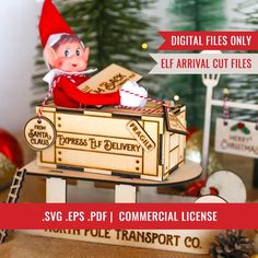 an elf is sitting on top of a box with the words, digital files only elf arrival cut files svg eps pf commercial license