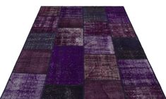 a purple rug with squares on it