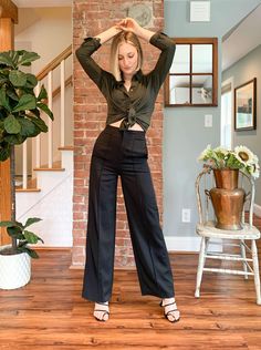 The Maeve pants are not a want but a NEED. We found these ultra flattering, black wide leg pants that work for work or a night out. Featuring a high rise structured waistline, zip up front and front pockets. A nice long inseam works for long legs or heels. Featuring two front seams down the leg. And let us just add that the quality of these are ON POINT. Fabric: 94% Poly, 6% Spandex. Dry Clean Only. Measurements of pants on a hanger: Small- Waist: 12" flat across, 13" Rise, 30" Inseam Medium- Wa Maeve Pants, French Boutique, Black Wide Leg Pants, Trendy Dress Outfits, Trendy Dress, Pants Wide Leg, Small Waist, Online Clothing Stores, Trendy Dresses