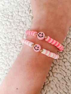 Cute and affordable preppy bracelets that match anything! Fun Pink Jewelry With Letter Beads, Pink Round Beads Bracelets, Fun Style, Fun Pink Bracelets With Round Beads, Pink Fun Bracelets With Round Beads, Playful Pink Jewelry With Letter Beads, Playful Pink Bracelets With Round Beads, Cute White Round Bracelets, Pink Stretch Bracelet For Beach, Cute Pink Round Beaded Bracelets