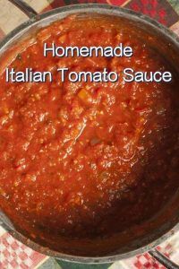 homemade italian tomato sauce in a pot on a checkered tablecloth with the words homemade italian tomato sauce