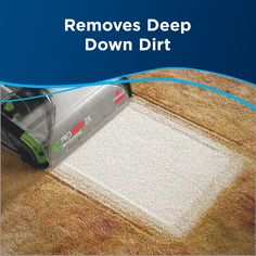 a carpet cleaning machine with the words remove deep down dirt