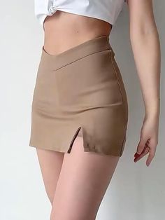 A must-have basic for your wardrobe. This high-waisted skirt features a tapered waist for a slimming effect. Cool side split with an inner lining to prevent slippage. Dress this number up or down! Cute Skirts Mini, Chic High Waist Skort, Fitted Solid Color Mini Bottoms, High Waist Stretch Mini Skirt, Stretch High Waist Solid Color Mini Skirt, Chic High Waist Solid Color Skort, Chic High-waist Solid Color Skort, Fitted High Waist Mini Skirt For Day Out, Split Design Pencil Skirt For Work