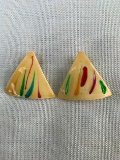 This series of earrings will pay homage to a beautiful woman from a 1980s, 1990s, or the early 2000s from a sitcom that we all loved to watch each week. The nostalgic feeling of this series of earrings will leave you humming the theme song while you walk down the street.  Please note these earrings have been cleaned with earring cleaner prior to shipping them to you.  Thanks for your support! Retro Yellow Earrings For Party, Retro Clip-on Earrings For Party, Earring Cleaner, White Retro Clip-on Earrings As Gift, Retro Yellow Party Earrings, Retro Yellow Earrings For Gifts, Retro White Clip-on Earrings As Gift, Retro Clip-on Earrings For Gift, Yellow Retro Party Earrings