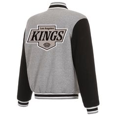 LA Kings JH Design Two-Tone Fleece Grey/Black Sleeve Reversible Jacket Elevate your game day style with the LA Kings JH Design Two-Tone Fleece Grey/Black Sleeve Reversible Jacket. This versatile jacket is designed for die-hard fans who want both style and functionality. Crafted with a sleek grey body and contrasting black sleeves, this jacket offers a modern and athletic look. The reversible design gives you two distinct styles in one piece: a bold team-colored look on one side and a more subtle Sporty Winter Outerwear For Game Day, Game Day Long Sleeve Winter Track Jacket, Long Sleeve Track Jacket For Game Day In Winter, Winter Long Sleeve Track Jacket For Game Day, Casual Black Outerwear For Game Day, Black Varsity Jacket For Game Day In Winter, Black Winter Varsity Jacket For Game Day, Sporty Team Logo Outerwear For Sports, Sporty Outerwear With Team Name For Fan Gear