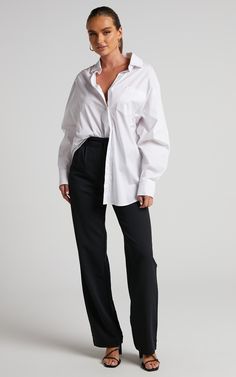 Introduce the Lorcan High Waisted Tailored Pants to your weekday wardrobe! These incredibly timeless and versatile pants will be your go-to pant for each and every occasion. They feature a high rise waist, tailored straight legs, side slip pockets and dart pleats. They're perfect for work and beyond, and can be dressed up or down depending on your vibe. Style it for work with the Terah Shirt in White and heeled sandals or for a casual day out with a baby tee and chunky sneakers!Product Details Relaxed Fit Dress Pants With Straight Hem For Work, Relaxed Fit Wide-leg Dress Pants For Workwear, Workwear Pants With Elastic Waistband And Straight Hem, Straight Hem Pants With Elastic Waistband For Work, Classic Relaxed Fit Bottoms For Work, Classic Relaxed Fit Wide Leg Pants For Business Casual, Classic Office Bottoms With Elastic Waistband, Classic Pants With Loosely Fitted Hips And Straight Hem, Casual Wide Leg Pants With Straight Hem For Office