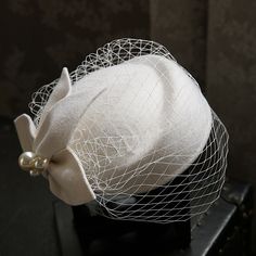 Look After Me:Washable; Gender:Women's; What's in the box:Hat; Types:Fascinator Hat; Holiday:Masquerade; Style:Retro Vintage,1950s; Occasion:Party / Evening; Material:Woolen; Age Group:Adults; Characters:Kate Middleton Felt Fascinator, Evening Hat, Fascinator Hats Wedding, Felt Fashion, Bridal Fascinator, Bridal Hat, Bride Headpiece, Wedding Hat, Elegant Hats