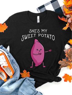 Product Name: Couples Black & Orange She's My Sweet Potato I Yam T-shirt For Thanksgiving, Christmas Gifts Item NO.: ZICO7839355764956 Weight: 0.2 kg = 0.4409 lb = 7.0548 oz Category: Clothing> Couple> T Shirts Tag: thanksgiving Creation Time: 2022-10-21 Story Of She is My Sweet Potato I YAMThe Ohio couple ���who are in She is My Sweet Potato Shirt and I YAM Shirt make the Intenet fall in love���She���s my sweet potato,��� the man���s shirt says. She posed, smiling and slightly leaning toward he Gift Black T-shirt With Funny Text, Cute Black T-shirt With Funny Text, Novelty Black T-shirt As A Gift, Novelty Black T-shirt As Gift, Novelty Black T-shirt For Gift, Fall Puns, Potato Shirt, Couple T Shirts, Christmas Gift Items