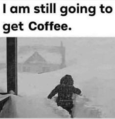 a person standing in the snow next to a window with words that read, i am still going to get coffee