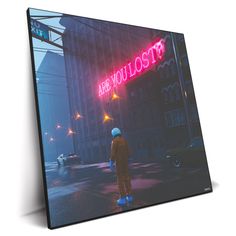 a man standing in the middle of a street under a neon sign that says are you lost?