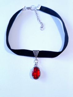 Ruby red black velvet Choker necklace Silver necklace Victorian necklace Bohemian necklace red pendant Vintage necklace Antique Gothic Choker necklace her gift  Victorian necklace . Bohemian necklace . Beautiful silver-tone Antique style ornaments and Ruby red  glass faceted oval crystal cabochon on silver toned pendant and black velvet choker necklace . Silver tone red pendant Victorian style necklace . Boho necklace. Bohemian necklace . Romantic necklace. Beautiful necklace with Ruby red penda Vintage Necklace Antiques, Gothic Choker Necklace, Black Velvet Choker Necklace, Choker Necklace Silver, Gothic Choker, Red Pendant, Velvet Choker Necklaces, Victorian Necklace, Choker Black