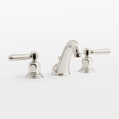 two chrome faucets with handles on each side, one is turned off and the other