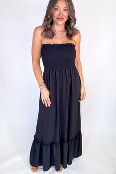 Be ready to shine in our Sunsational Maxi Dress! This flowy, strapless boho beauty will have you feeling effortlessly stylish at any occasion. Show off your shoulders in smocked detail and be the center of attention (in the best way!) Fit: She is wearing her true size medium. Fits true to size. If in between sizes, size down. Strapless Bandeau Dress With Smocked Back For Day Out, Vacation Strapless Dress With Smocked Bodice, Chic Ruched Strapless Dress For Vacation, Vacation Strapless Bandeau Dress With Smocked Bodice, Summer Strapless Tube Top With Smocked Back, Strapless Summer Tube Top With Smocked Back, Strapless Tube Top With Smocked Back For Day Out, Casual Strapless Bandeau Dress With Smocked Back, Chic Strapless Dress With Smocked Bodice For Day Out