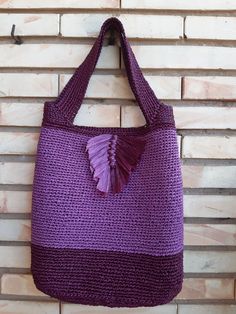 Women's bag crocheted from viscose raffia in color purple and burgundy vine. Raffia is a natural, environmentally friendly, biodegradable and hygroscopic material. The bag is stylish, comfortable, roomy, light and very durable, it will last more than one year. For the season spring-summer. Dimensions: wide 32 cm height 31cm base width 8 cm strap length 47 cm (2 straps) Care: Do not wash. Wipe it with a clean damp cloth. In case the bag is wrinkled or out of shape, you can steam it with an iron a Purple Shoulder Bag With Braided Handles For Shopping, Purple Tote Bag With Braided Handles, Rectangular Purple Crochet Shopping Bag, Purple Rectangular Crochet Shopping Bag, Handmade Purple Crochet Bag For Daily Use, Purple Tote Shoulder Bag With Braided Handles, Purple Shoulder Bag With Braided Handles For Daily Use, Rectangular Crochet Bag In Purple, Bohemian Purple Crochet Bag