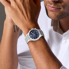 With elegant sophistication, Swiss craftsmanship and sporty style, the Movado SE men's watch makes a statement. 42mm brushed and polished stainless steel case with lug accents on the bezel Deep blue sunray dial with three chrono sub-dials, silver-tone hands and markers with Super-LumiNova, date display, signature dot and sapphire crystal Brushed and polished stainless steel bracelet with lug accents and push-button deployment clasp Water-resistant to 50 meters Leo Diamond, Movado Watch, Mens Gemstone Rings, Wedding Ring Necklaces, Gold Diamond Jewelry, Polished Stainless Steel, Men's Rings, Sporty Style, Jewelry Rings Engagement