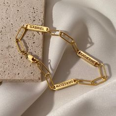 Introducing the Multiple Name Bracelet -- stunning and sophisticated, yet subtle and effortlessly cool. With its distinctive simplicity, this personalized necklace complements any style while still making a timeless statement. Personalize it for yourself or as a special gift for someone special in your life! Make occasions like birthdays, anniversaries, graduations, Mother's Day or Christmas special by gifting them this one-of-a-kind treasure they will cherish for years to come ► PRODUCT INFORMA Affordable Personalized Gold Chain Bracelet, Minimalist Custom Name Metal Jewelry, Elegant Metal Name Bracelet For Mother's Day, Metal Nameplate Bracelet For Gift, Elegant Stainless Steel Bracelet With Custom Name, Elegant Stainless Steel Name Bracelet, Personalized Metal Chain Bracelet For Anniversary, Elegant Metal Bracelet With Custom Name, Elegant Customizable Bracelet