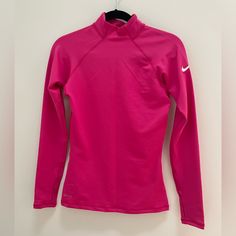 New Without Tags, Never Worn. Long Sleeve Dri-Fit Top With Thumb Holes In Both Sleeves. Perfect For Outdoor Runs In Cold Weather. Nike Fitted Tops In Solid Color, Nike Fitted Solid Tops, Running In Cold, Athletic Long Sleeve, Long Sleeve Running Shirt, Running In Cold Weather, Tops Nike, Running Shirts, Pink Long Sleeve