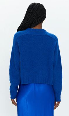 The Adina Sweater is the perfect addition to your winter wardrobe. It features a classic sweater fit in a vibrant blue hue, along with its soft and slightly fuzzy fabric. The ribbed hem and slightly cropped length make it a statement piece that will be sure to turn heads. Stay warm and stylish this season with Adina! 64% Acrylic, 13% Polyester, 9% Nylon, 8% Alpaca, 4% Wool, 2% Spandex Hand Wash or Dry Clean Fuzzy Fabric, Athleisure Shoes, Geometric Knit, Everyday Sweater, Classic Sweater, Sweater Fits, Fuzzy Sweater, Sweater Sale, Vibrant Blue