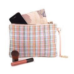 This pastel plaid pouch is an attention-grabbing accessory with a summer chic form and deceivingly spacious interior. The Sunrise Clutch effortlessly stores your phone, lipstick, wallet, and accessories. This design makes an easy piece to nest within your tote bag, or worn on its own. Size: 22cmx15.5cm 8 3/4"x 6 1/4" Chic Clutch With Cell Phone Pocket For On-the-go, Trendy Travel Clutch Wallet, Chic Summer Phone Bag For Everyday Use, Chic Rectangular On-the-go Pouch, Chic Rectangular Clutch With Cell Phone Pocket, Trendy Everyday Clutch Wallet, Trendy Daily Use Pouch For Spring, Trendy Everyday Clutch Phone Bag, Trendy Spring Pouch For Daily Use