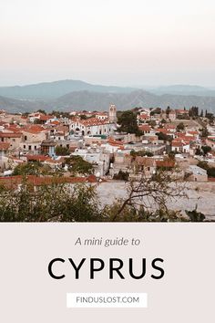 a city with mountains in the background and text overlay that reads a mini guide to cyprus