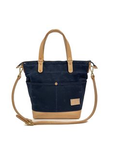 Our 76th St Tote with Navy waxed canvas and Navy leather. Our most popular style and a versatile favorite. Exterior of both veg-tanned leather and 20oz waxed canvas. Six interior and four exterior pockets to keep you on top of organization. Note: May have black or navy zipper. **All Navy Bag sales are final! No returns, refunds, or exchanges** Please allow all on-line orders 7-10 business days to be completed by production. Navy Bag, Handbag Patterns, Navy Leather, Waxed Canvas, Popular Style, Bag Sale, Camera Bag, Most Popular, Exterior