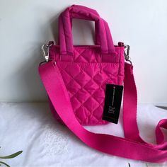 Inc International Concepts Nylon Rachell Quilted Mini Crossbody, Pink, Nwt Color: Orchid (Pink) Material: Body: Polyester; Trim: Pu; Lining: Polyester Hardware: Silver Tone Interior: 2 Interior Slip Pockets & 1 Zip Pocket Exterior: 1 Slip Pocket & 1 Side Zip Pocket Closure: Magnetic Snap Closure Dimensions: Mini Sized Bag Bag: 5.5”W X 7”H X 2”D Removable Crossbody Strap: 25”L Top Handle: 3”L Condition: New With Tag Nylon Mobile Phone Bag, Pink Nylon Mobile Phone Bag, Chic Pink Nylon Bag, Spring Quilted Nylon Bags, Nylon Shoulder Bag For Spring, Spring Nylon Shoulder Bag, Mini Crossbody, Bag Bag, Inc International Concepts