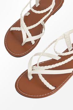 Stay stylish and comfortable in the Braided Strappy Faux Leather Sandals. With their chic braided straps and faux leather material, these sandals are perfect for both casual outings and dressed-up occasions. Product code: CAB02A4G001CH Features:  Almond toe Strappy design Braided detailing Slip-on styling. Casual Beach Sandals With Braided Trim, Casual Braided Trim Sandals For Beach, Casual Braided Sandals For Beach, Casual Braided Trim Beach Sandals, Adjustable Sandals With Braided Trim For Beach, Adjustable Beach Sandals With Braided Trim, Adjustable Braided Trim Sandals For Beach, Summer Sandals With Braided Trim And Adjustable Fit, Leather Sandals With Braided Trim For Beach