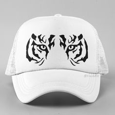 New Hat. For Men Or Women. Tiger Eyes Graphic Foam Trucker Hat In White. Lightweight Poly-Foam Trucker Cap With Mesh Back Curved Bill Visor For Optimal Shading Adjustable Plastic Snap Strap Rope Braid Detail Adult Unisex One Size Fits Head Circumferences Up To 60cm Style Tags # Animal Face Hunter Prowl Jungle Big Cat Bengal Siberian Arctic White Tiger Stripes Black Print Baseball Hat Cap Vacation Travel Hot Weather Guys Mens Womens Teens Casual Outdoors Original Custom Cool Unique Handmade Trend Eyes Graphic, Snow Tiger, Cat Bengal, Tiger Eyes, Rope Braid, Hat For Men, White Tiger, Tiger Stripes, Big Cat