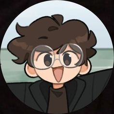 a person with glasses making a funny face in front of an ocean and sky background