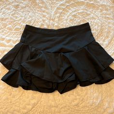 Skirt With Shorts Underneath/ Size L/ New/ Never Worn/ Smoke And Pet Free Home:) Skirts With Shorts Underneath, Night Out Lined Skirted Bottoms, Black Party Bottoms Short Inseam, Black Party Bottoms With Short Inseam, Black Skirted Shorts For Party, Chic Bottoms With Built-in Shorts And Tiered Skirt, Black Skirted Party Shorts, Casual Party Bottoms With Lined Skirt, Casual Black Tiered Skirt Shorts