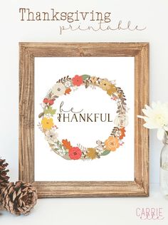 a cross stitch pattern with the words be grateful surrounded by flowers and pine cones