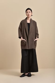 Premium & natural 100% mud silk clothes, hand-dyed with natural plants, designed and handmade by a family women-found studio based in Hainan Island and Brooklyn, NY. Design: Elevate your wardrobe with our oversized kimono jacket, meticulously crafted from luxurious Xiangyun silk. This jacket features a rich, earthy brown hue and a minimalist design that exudes effortless elegance. The open front and wide sleeves offer a relaxed fit, making it perfect for layering over any outfit. The two spacious pockets add both style and functionality. Made from 100% mulberry silk and naturally dyed, this jacket is a testament to sustainable fashion. Ideal for casual outings or sophisticated gatherings, this piece seamlessly blends tradition with contemporary style. - Oversized kimono jacket - Open front Brown Kimono Outfit, Brown Linen Outerwear With Relaxed Fit, Brown Relaxed Fit Linen Outerwear, Relaxed Fit Long Sleeve Outerwear With Natural Dye, Japanese Oversized Fashion, Kimono Jacket Outfit, Japanese Fashion Minimalist, Sustainable Fashion Aesthetic, Japanese Fashion Aesthetic