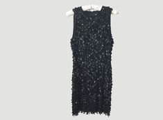 "Black tank mini dress dripping in diamond shaped sequin pailettes by DKNY. Size: 6 (US) Material: 100% Silk Outer / 100% Rayon Lining Care: Spot Clean Only  Length: 34\" Bust: 34\" Waist: 28\" Hips: 36\" Shoulder: 11.5 Condition: A couple loose threads but otherwise excellent condition. Era: 90's" Style Party Dress, Flapper Style, Mini Tank Dress, Style Party, Vestidos Vintage, Sleeveless Mini Dress, Donna Karan, Beaded Dress, Dress Vintage