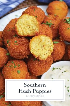 crispy hush puppies on a plate with ranch dip