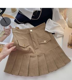 Style: commuting Size: S M L XL Color: apricot, black, khaki, coffee High-waisted Brown Corduroy Skirt, Trendy Khaki Mini Skirt For Fall, Beige Casual Mini Skirt For Winter, Trendy Beige Mini Skirt For Fall, Trendy Corduroy Mini Skirt For Winter, Winter Cotton Skirt In Beige, Winter Beige Cotton Skirt, Trendy Winter Corduroy Mini Skirt, Trendy Beige Mini Skirt For Winter