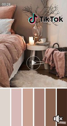 a bed room with a neatly made bed and lots of color swatches on the walls