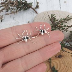 "Big Spider Stud earrings, Sterling silver Post Earrings, Spooky gift, Spider jewelry, Punk Rock gothic jewelry, Fun earrings, Insect lovers Big spooky stud for Spider lovers! Average weight: 1.50 gr (one pair) Length: 1.8 cm Width: 2 cm Studs are in 925 Sterling Silver, Nickel Free SHIPPING: We use Standard International Air Mail ** 7-10 working days for EUROPE and 7-20 working days WORLDWIDE For UK we use 2o Class \"Signed For\" 3-5 working days. If you want faster delivery you can purchase 1s Spooky Silver Earrings For Gift, Second Hole Earrings, Spider Jewelry, Spooky Gifts, Average Weight, Hippie Jewelry, Gothic Jewelry, Brass Jewelry, Fun Earrings