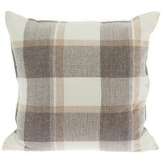 a brown and white plaid pillow on a white background