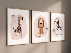 three framed art prints with animals on them