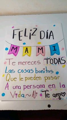 a sign that says feliz dia mam to be mereces today