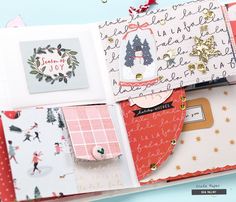 an open christmas card box with lots of different cards and envelopes on top of it